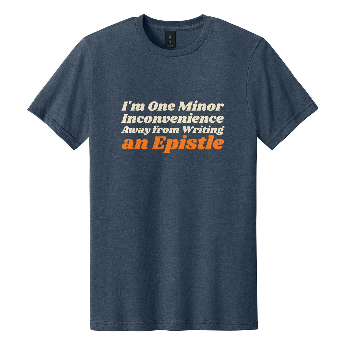 I'm One Minor Inconvenience Away from Writing an Epistle tee in Navy Mist, Shrikhand font, Cream + Orange ink