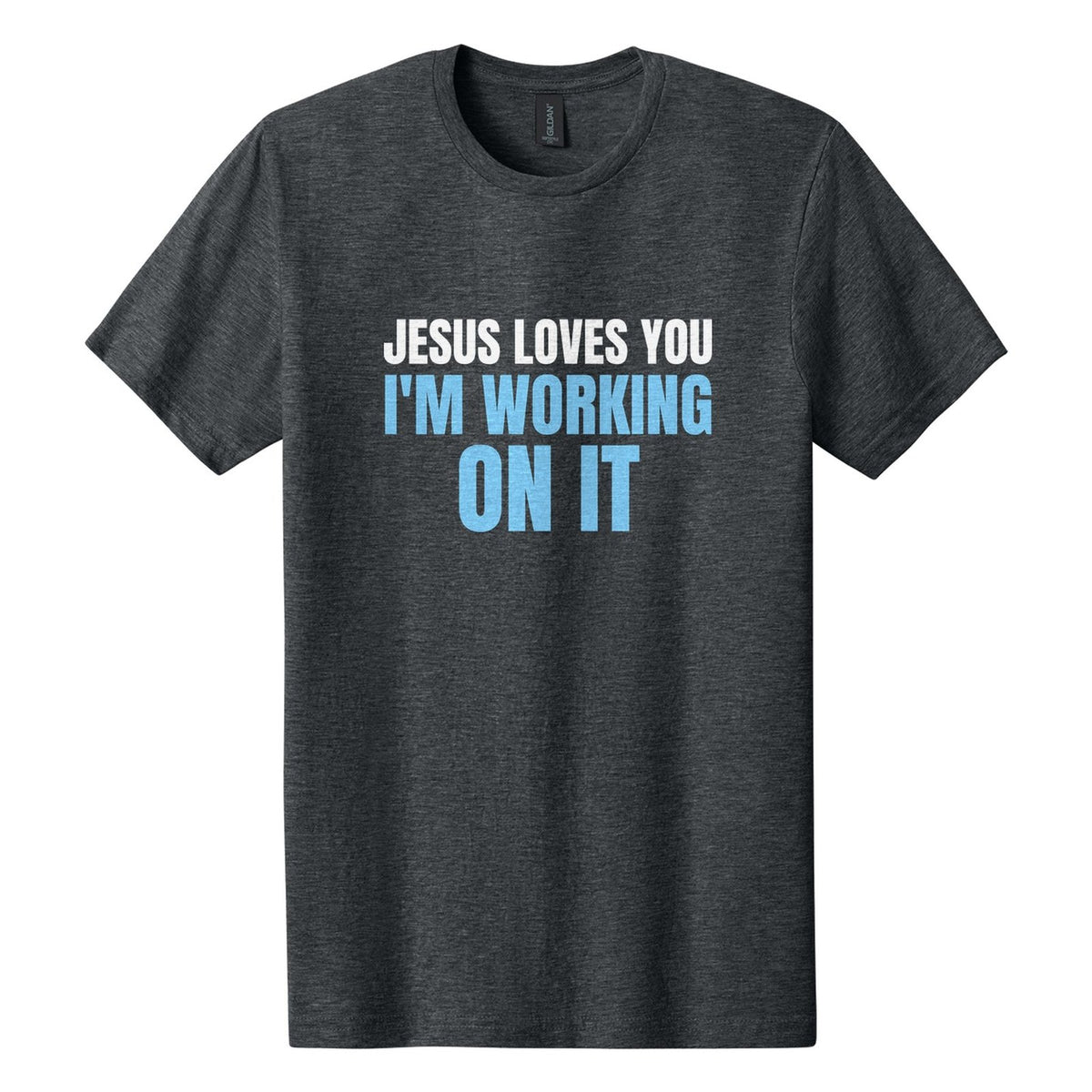 Jesus Loves You. I'm Working on It tee in Dark Heather, Anton font, White + Sky Blue ink