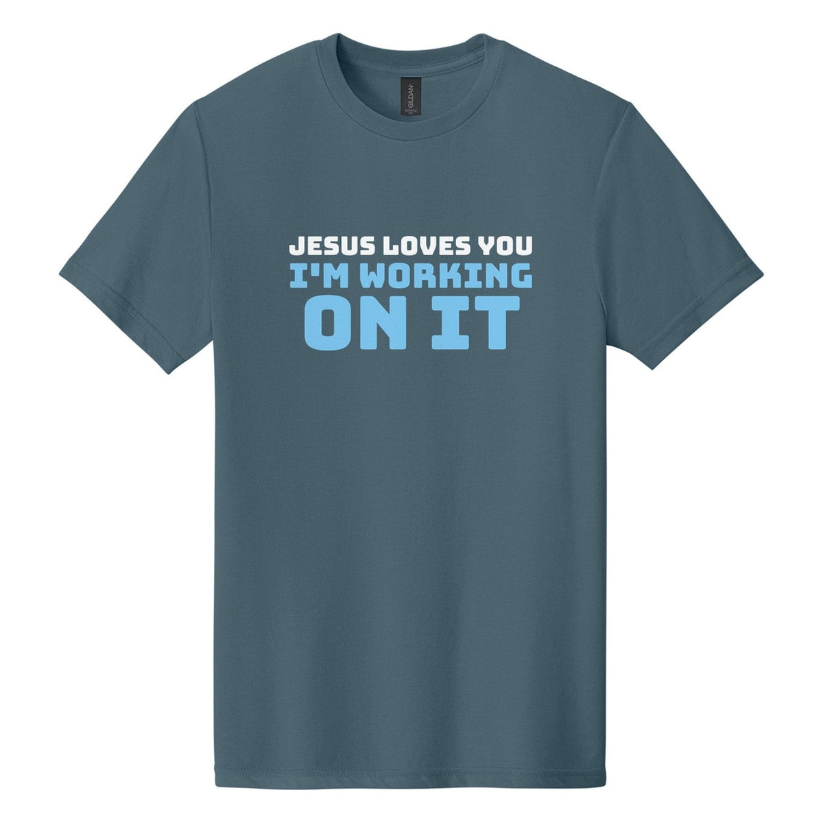 Jesus Loves You. I'm Working on It tee in Steel Blue, Bungee font, White + Sky Blue ink