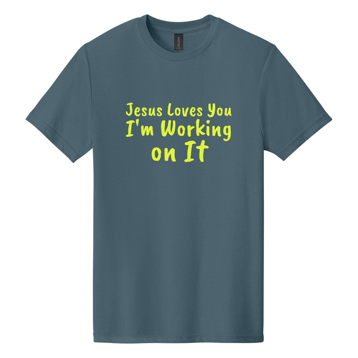 Jesus Loves You. I'm Working on It tee in Steel Blue, Caveat Brush font, Neon Yellow ink