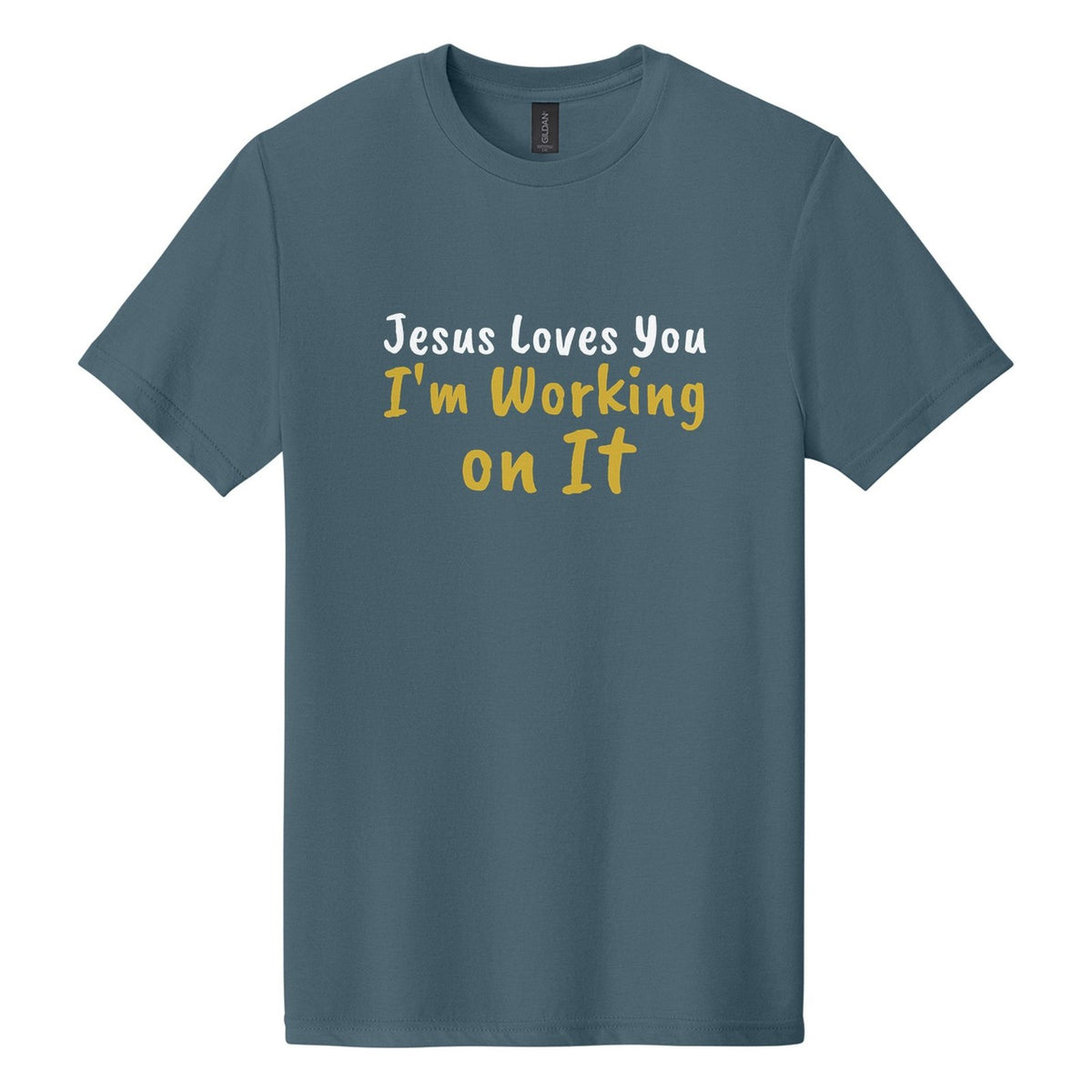 Jesus Loves You. I'm Working on It tee in Steel Blue, Caveat Brush font, White + Metallic Gold ink