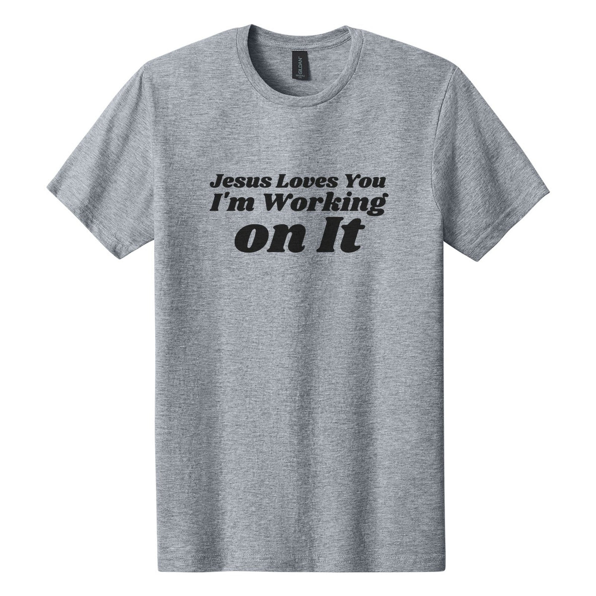 Jesus Loves You. I'm Working on It tee in Ring Spun Sport Grey, Shrikhand font, Black ink