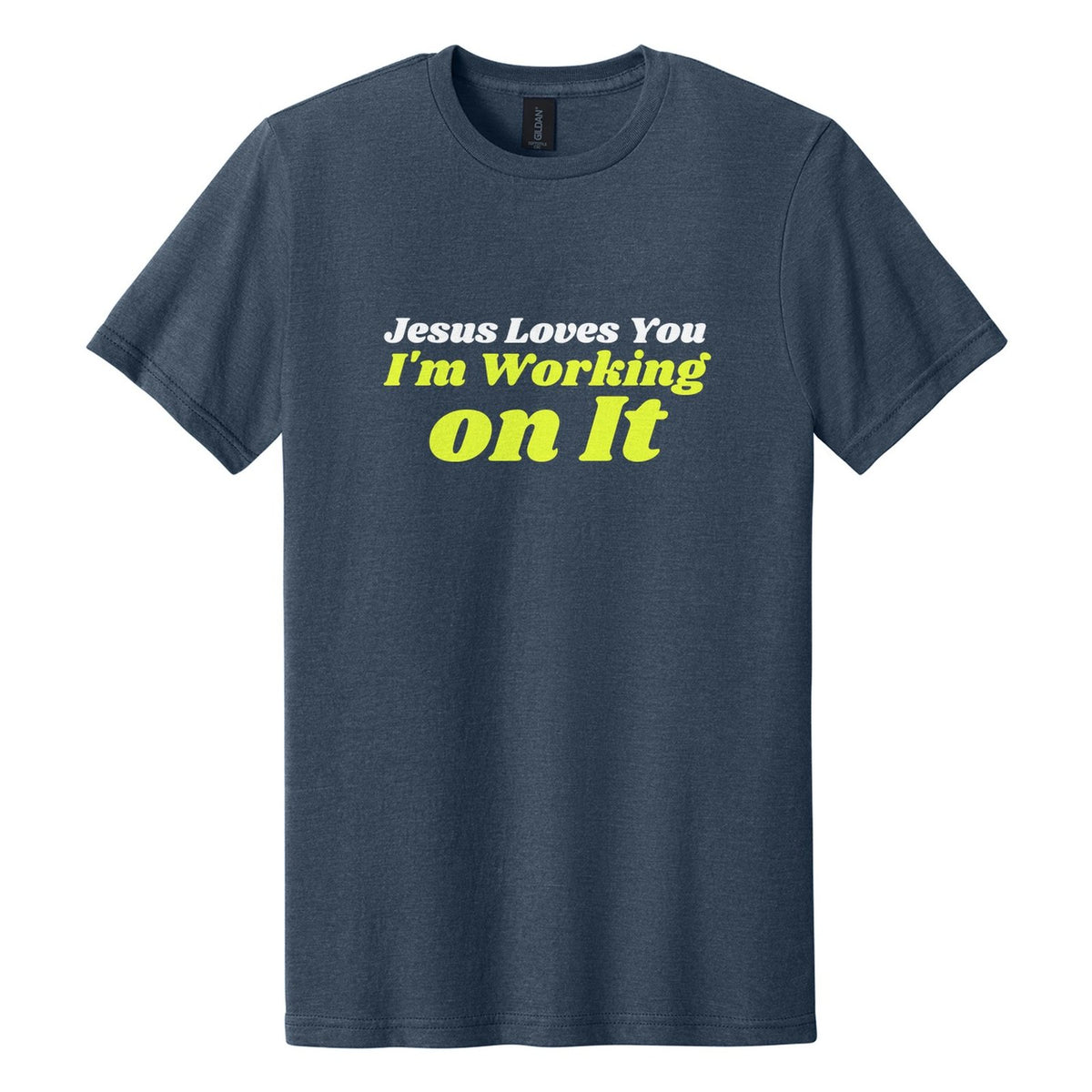 Jesus Loves You. I'm Working on It tee in Navy Mist, Shrikhand font, White + Neon Yellow ink