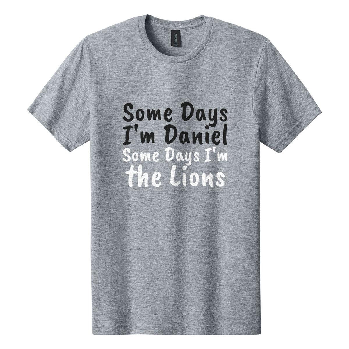 Some Days I'm Daniel. Some Days I'm the Lions tee in Ring Spun Sport Grey, Caveat Brush font, Black + White ink