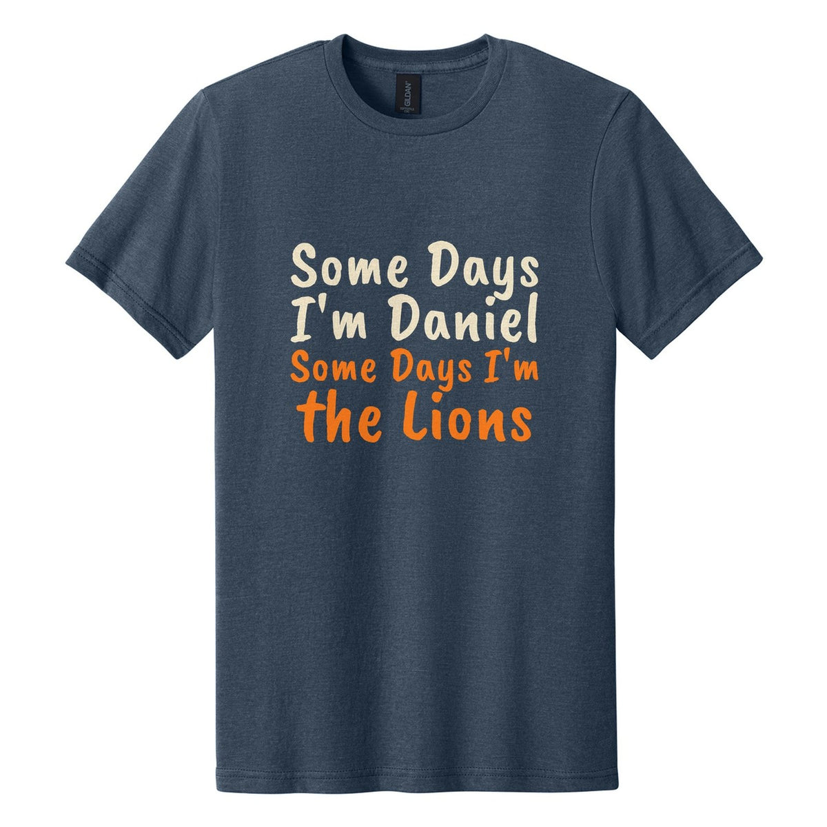 Some Days I'm Daniel. Some Days I'm the Lions tee in Navy Mist, Caveat Brush font, Cream + Orange ink