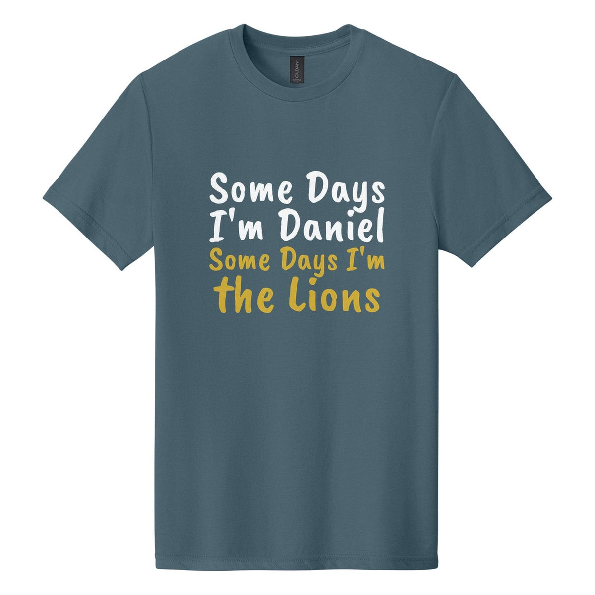 Some Days I'm Daniel. Some Days I'm the Lions tee in Steel Blue, Caveat Brush font, White + Metallic Gold ink