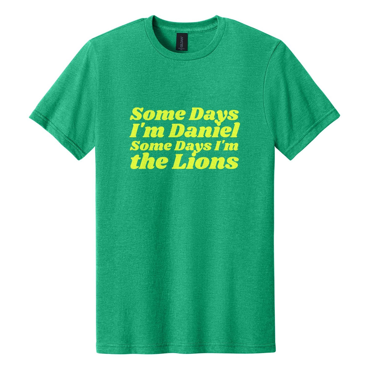 Some Days I'm Daniel. Some Days I'm the Lions tee in Kelly Mist, Shrikhand font, Neon Yellow ink