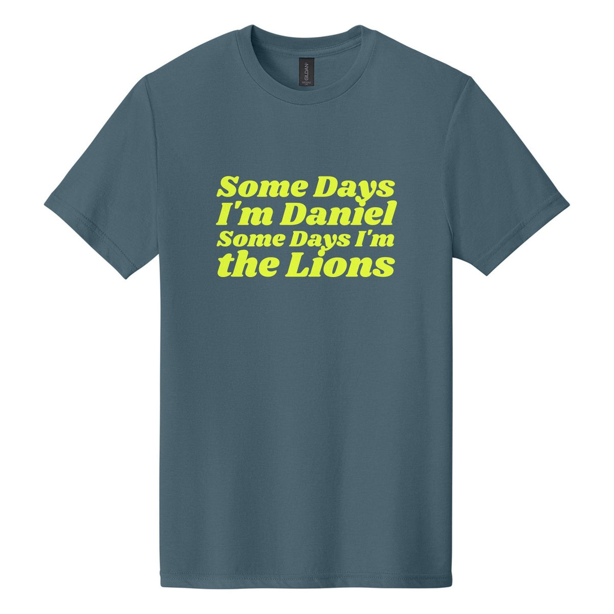 Some Days I'm Daniel. Some Days I'm the Lions tee in Steel Blue, Shrikhand font, Neon Yellow ink