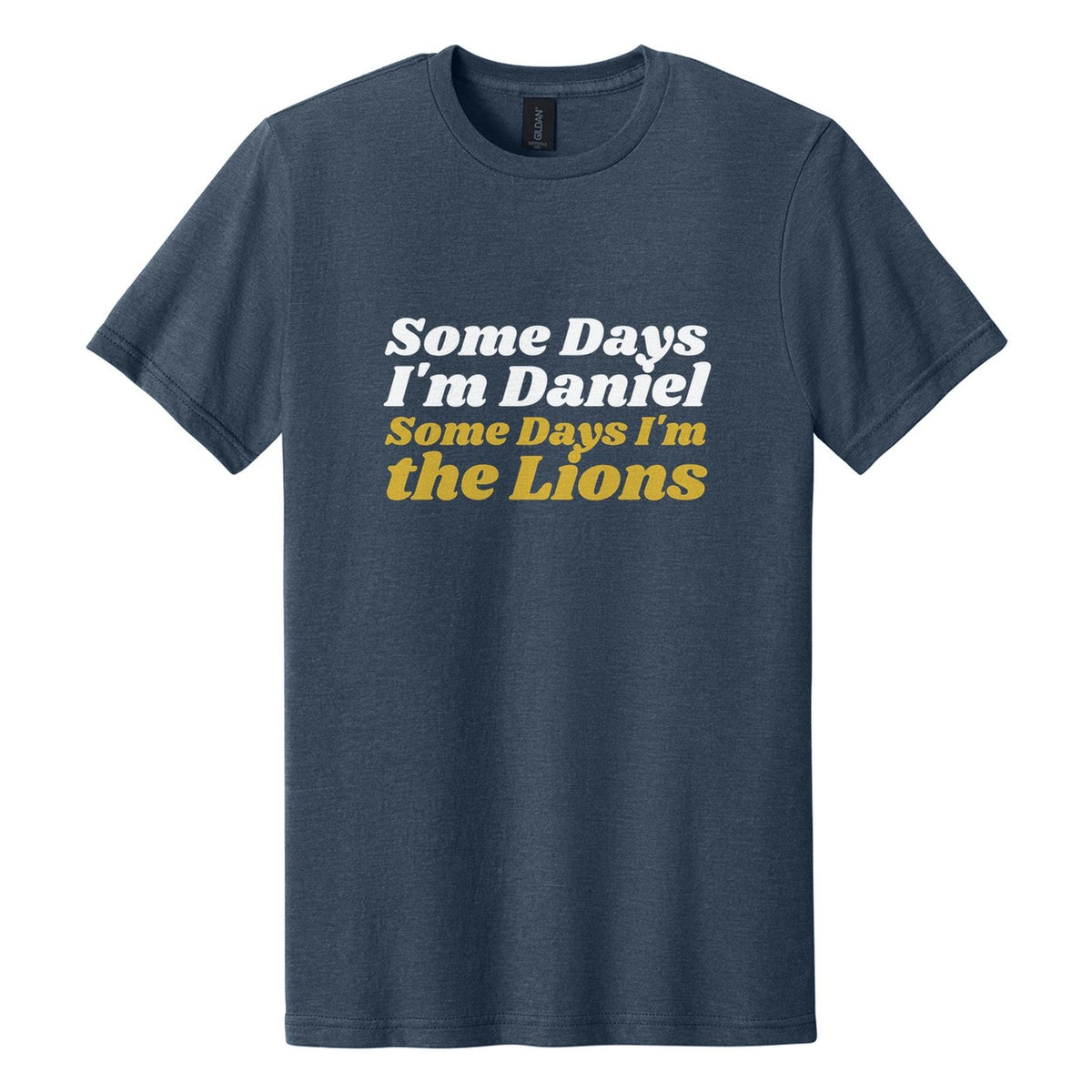 Some Days I'm Daniel. Some Days I'm the Lions tee in Navy Mist, Shrikhand font, White + Metallic Gold ink