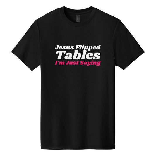 Jesus Flipped Tables. I'm Just Saying tee in Pitch Black, Shrikhand font, White + Hot Pink ink
