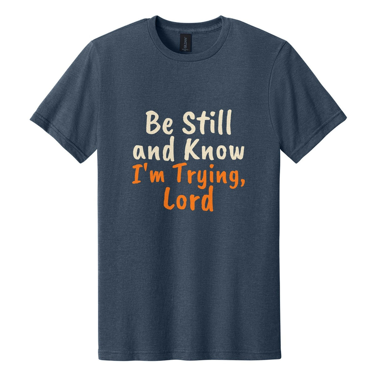 Be Still and Know. I'm Trying, Lord tee in Navy Mist, Caveat Brush font, Cream + Orange ink