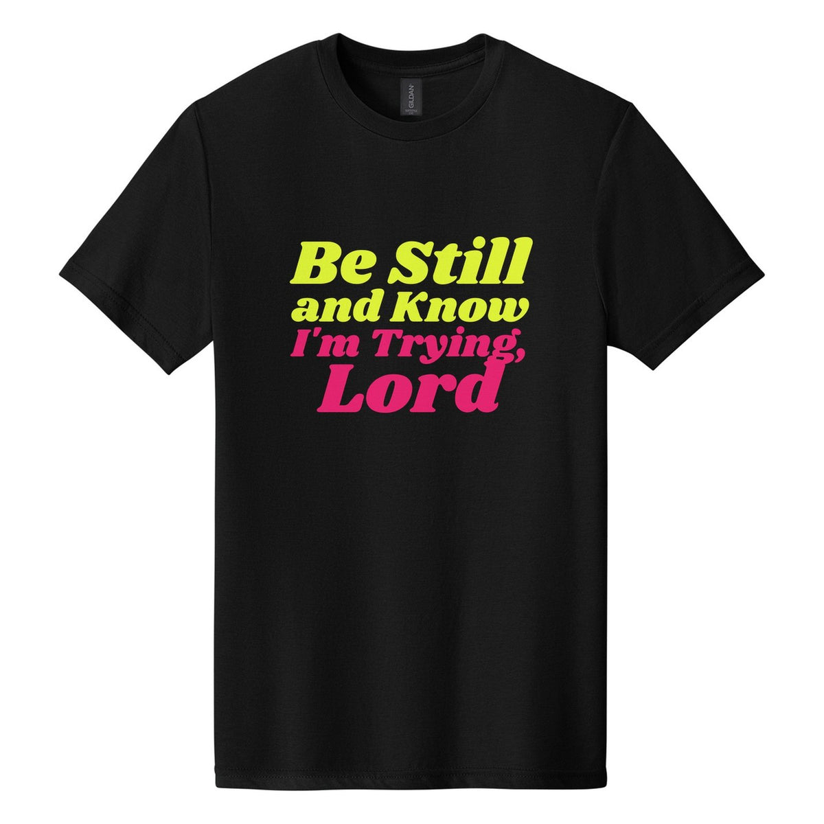 Be Still and Know. I'm Trying, Lord tee in Pitch Black, Shrikhand font, Neon Yellow + Hot Pink ink