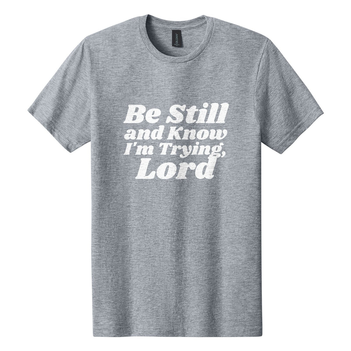 Be Still and Know. I'm Trying, Lord tee in Ring Spun Sport Grey, Shrikhand font, White ink