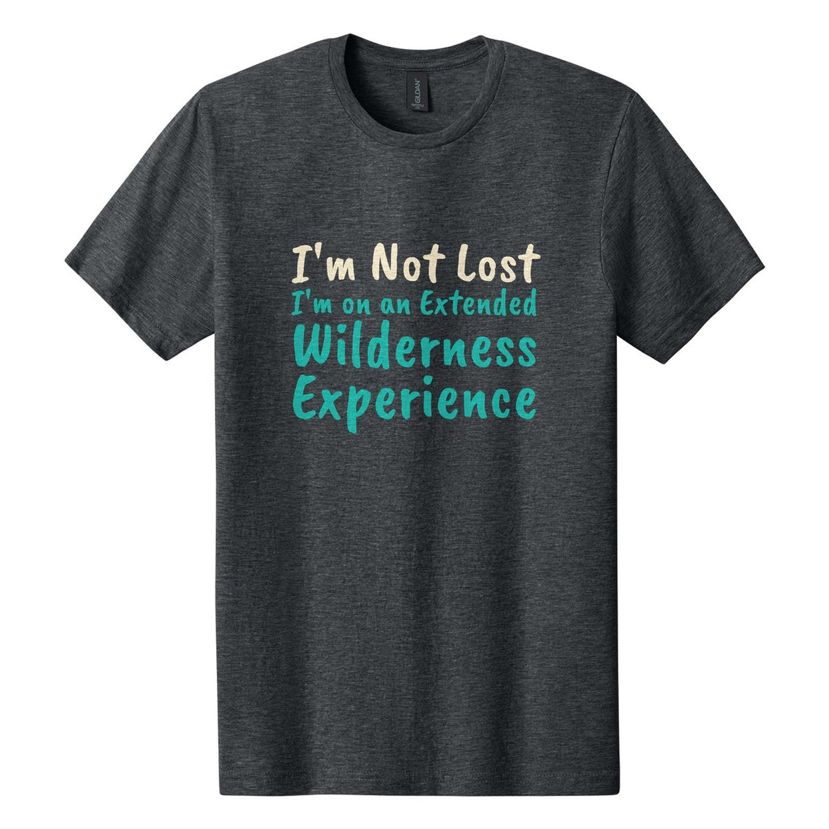 I'm Not Lost. I'm on an Extended Wilderness Experience tee in Dark Heather, Caveat Brush font, Cream + Teal ink