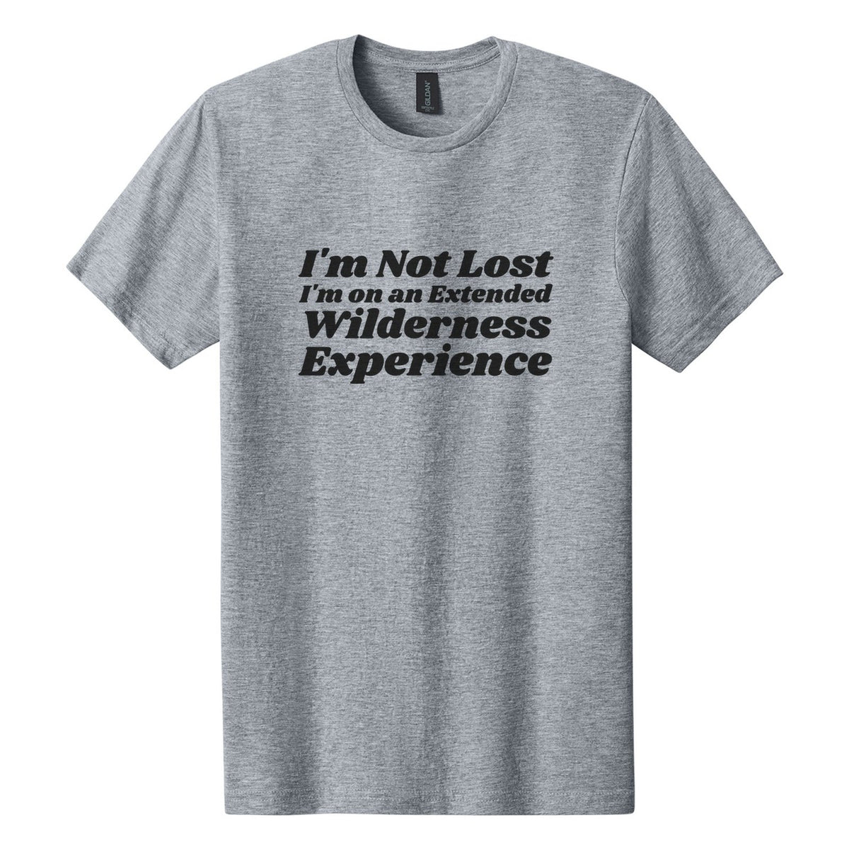 I'm Not Lost. I'm on an Extended Wilderness Experience tee in Ring Spun Sport Grey, Shrikhand font, Black ink