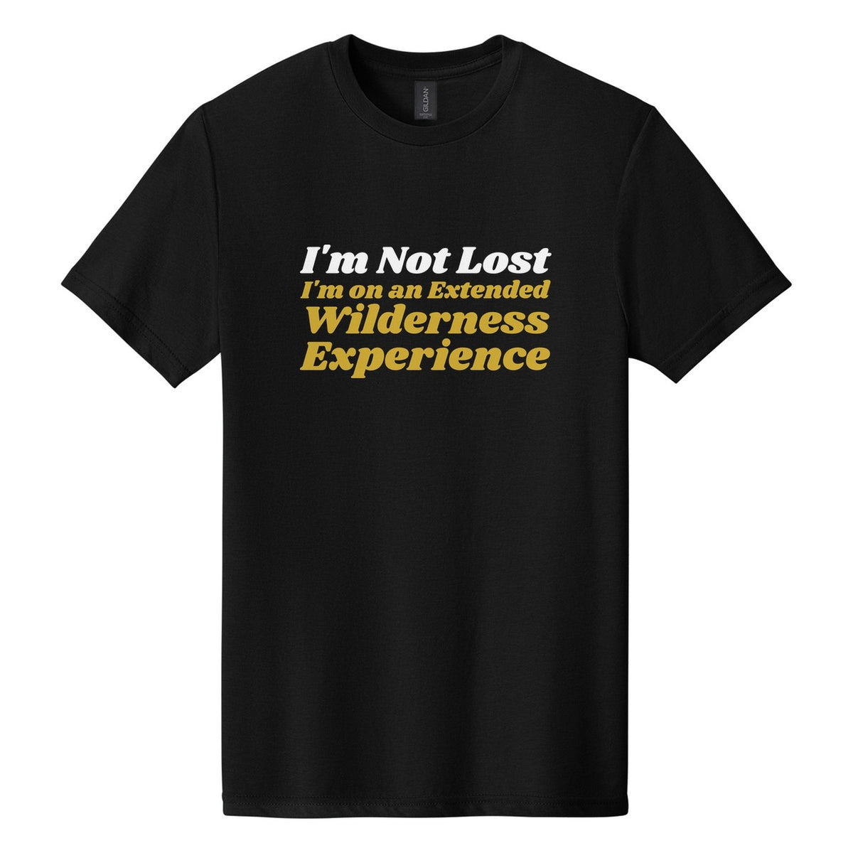 I'm Not Lost. I'm on an Extended Wilderness Experience tee in Pitch Black, Shrikhand font, White + Metallic Gold ink