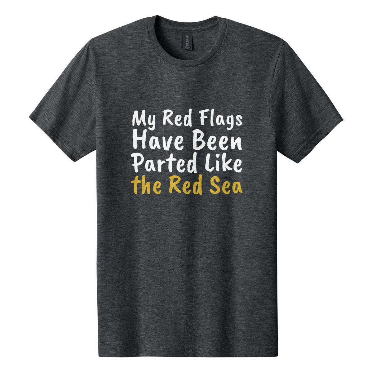 My Red Flags Have Been Parted Like the Red Sea tee in Dark Heather, Caveat Brush font, White + Metallic Gold ink