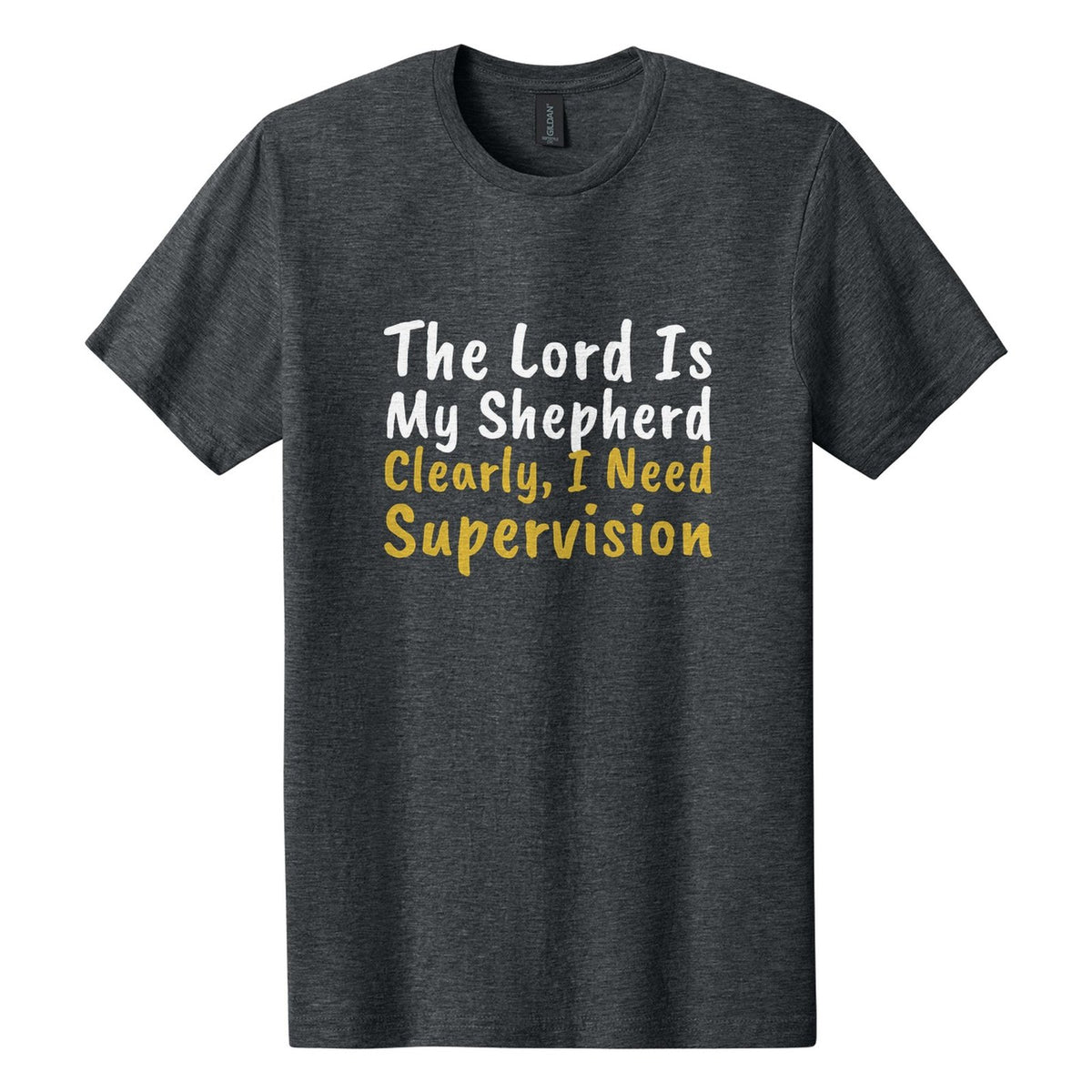 The Lord Is My Shepherd. Clearly, I Need Supervision tee in Dark Heather, Caveat Brush font, White + Metallic Gold ink