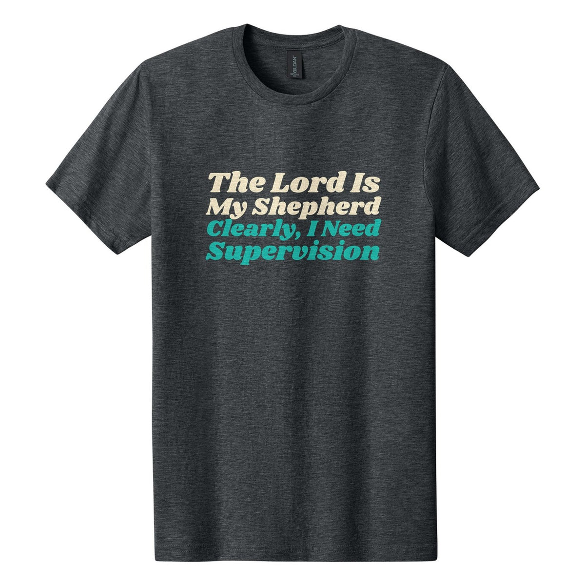 The Lord Is My Shepherd. Clearly, I Need Supervision tee in Dark Heather, Shrikhand font, Cream + Teal ink