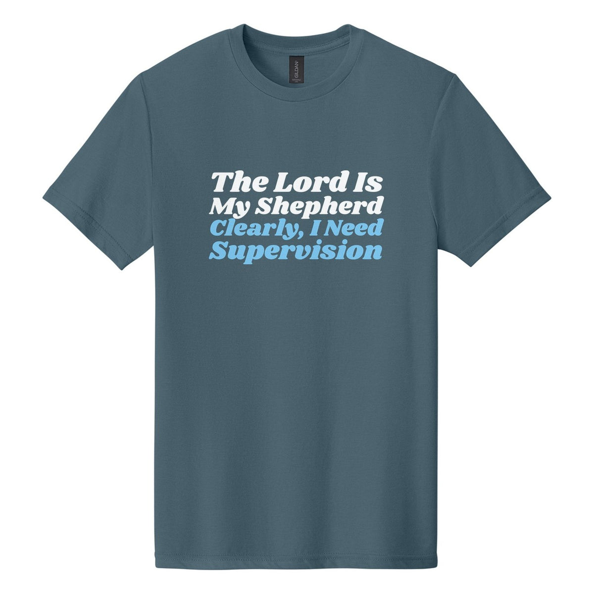 The Lord Is My Shepherd. Clearly, I Need Supervision tee in Steel Blue, Shrikhand font, White + Sky Blue ink